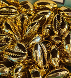 Gold dipped cowrie shells