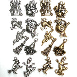 pewter charms in silver and gold finishes. Each set includes a haunted house, witch with cauldron, cat, trick or treat basket, ghost, broom, witch face, witch on a broom, and a ghost with the word "boo!" written on the charm. All on a white background