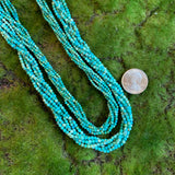 Turquoise Strands - Faceted Rounds