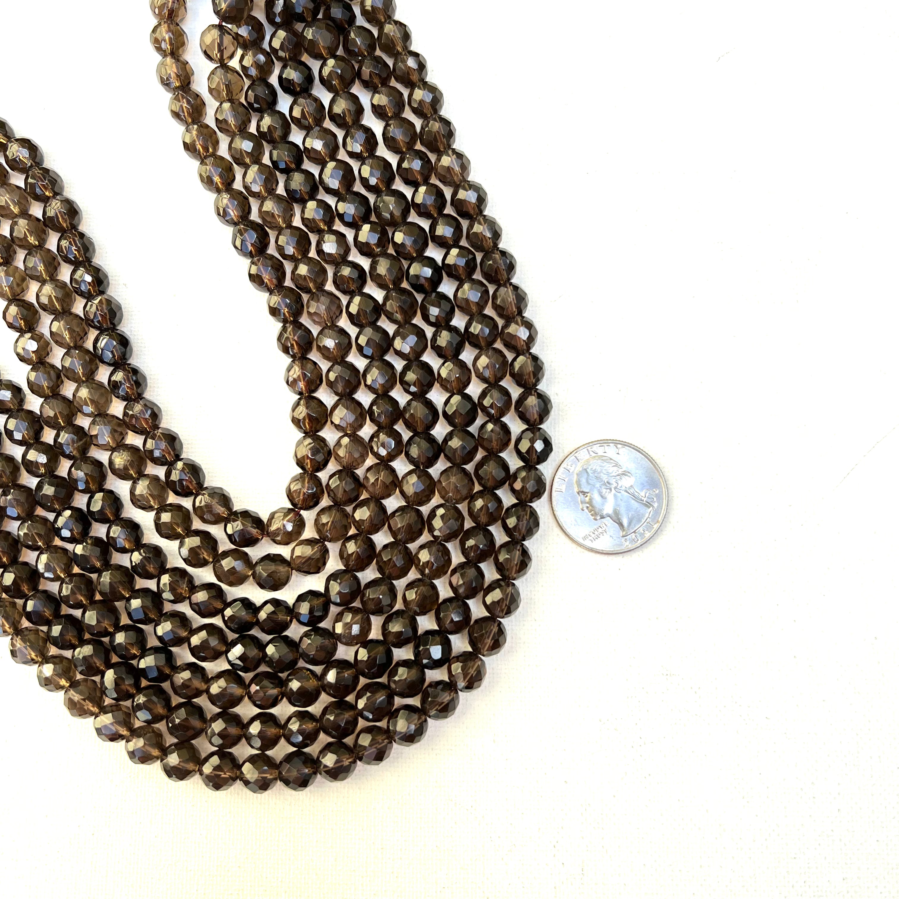 8mm faceted stone quartz with quarter for scale