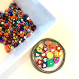 Kit includes jewelry making supplies such as seed beads and fruit beads to make your own phone lanyard/phone holder. 