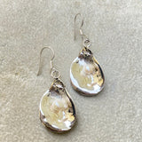 Small sterling silver oyster earrings with real freshwater pearls