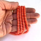 Coral strand - dyed orange rondelle
