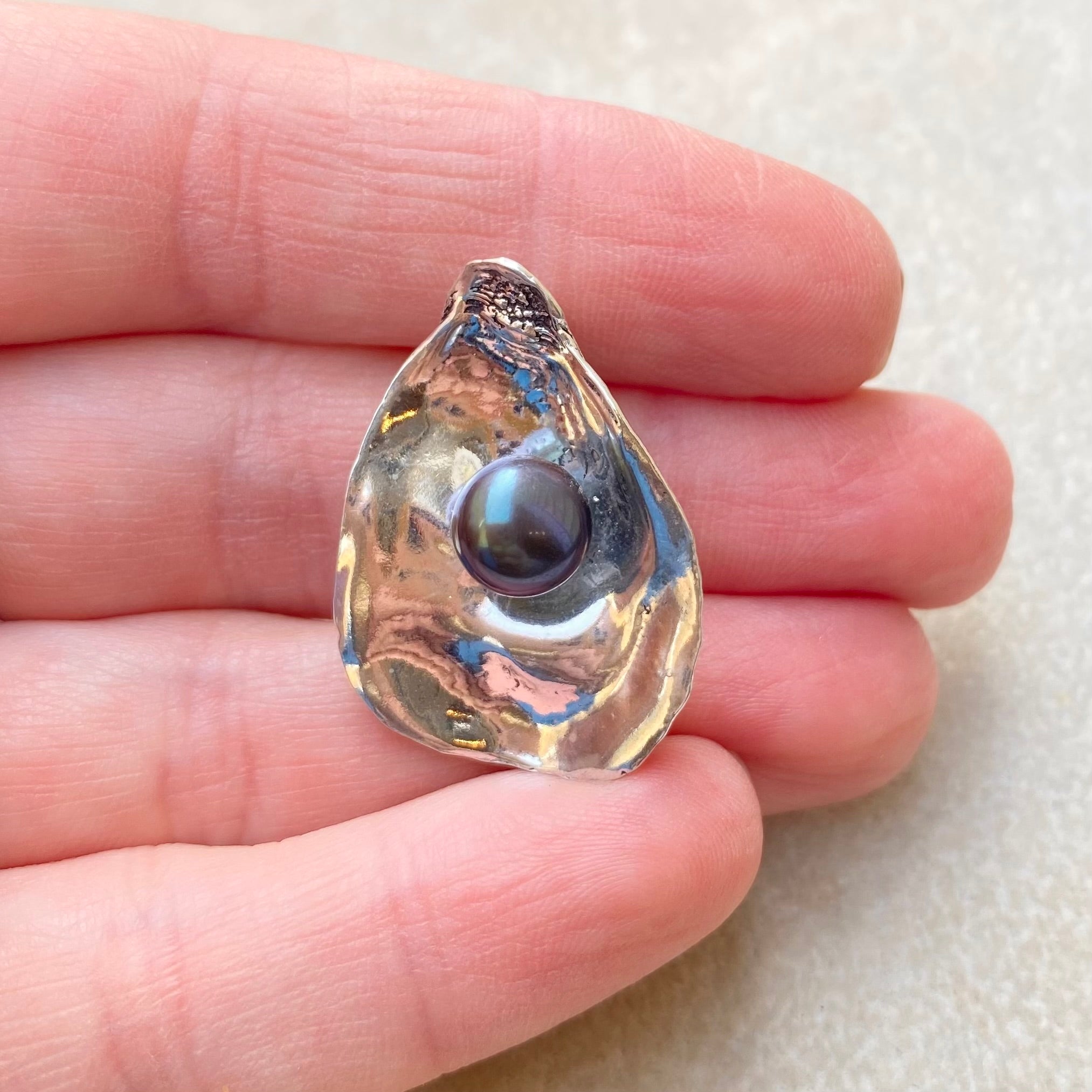 Sterling Oyster pendant with a real black freshwater pearl