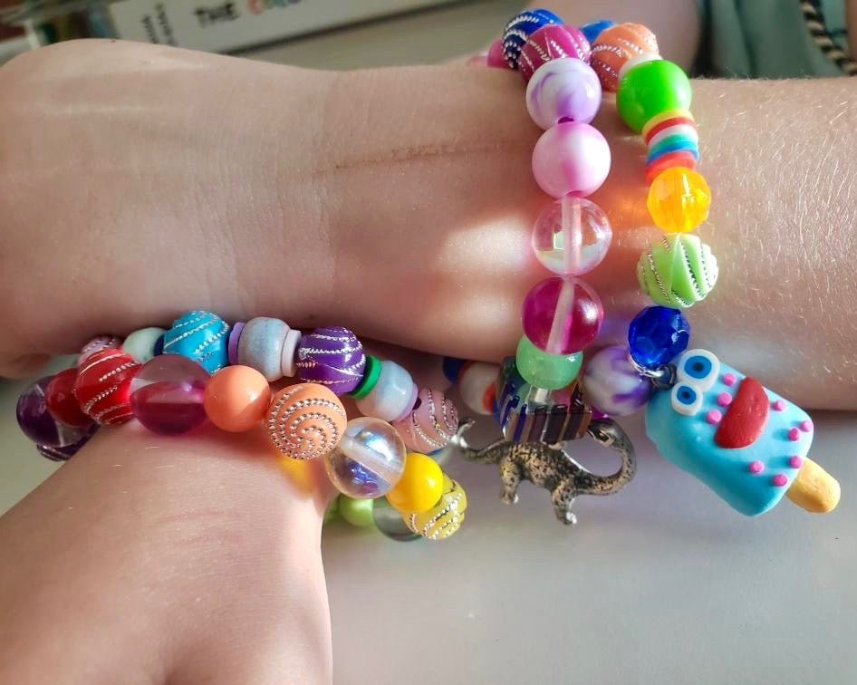 Bead kit full of jewelry making supplies perfect to make beaded bracelets. Kit includes glass beads, seed beads, heishi beads and charms