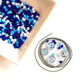 Kit includes jewelry making supplies such as seed beads and evil eye beads to make your own phone lanyard/phone holder